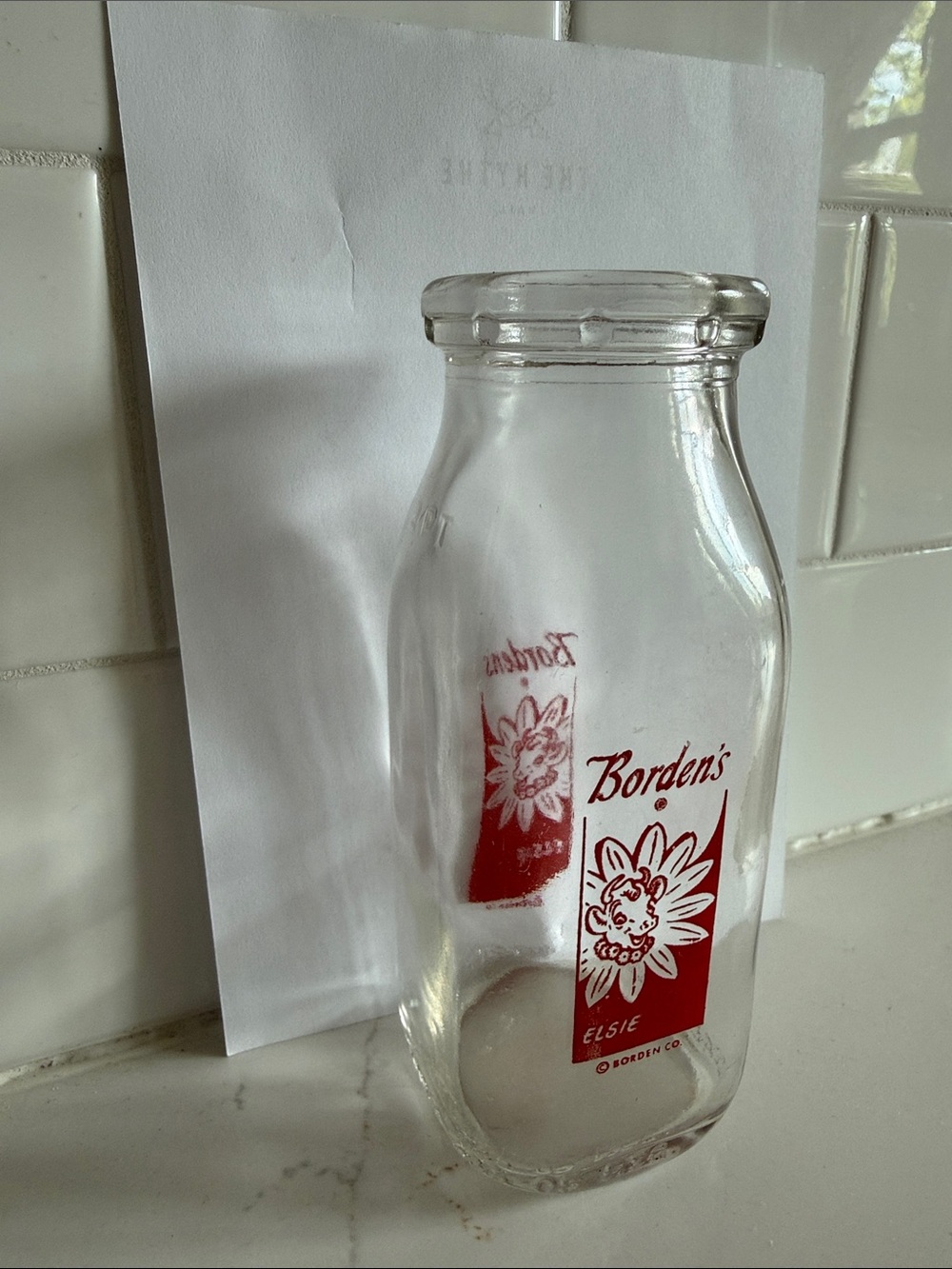 Clear Glass Milk Bottle with Red Logo